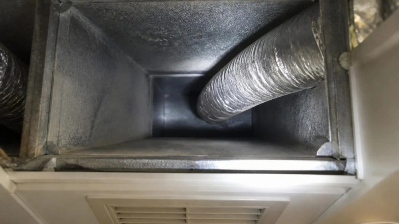 Inside a yacht air supply duct through an access panel